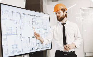architect-engineer-man-shows-plan-building-tv-screen_1157-48543 1
