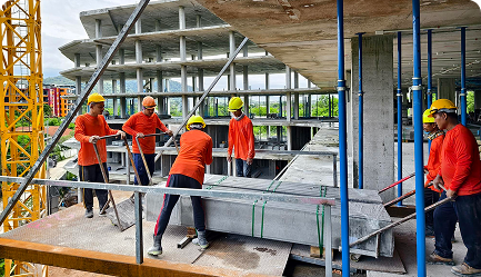 workers-building-construction-take-slabs-from-crane_179755-29476 1